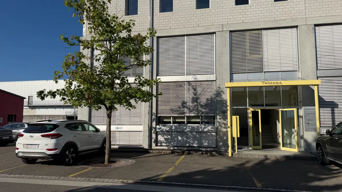 Visitor parking to the left of the main entrance